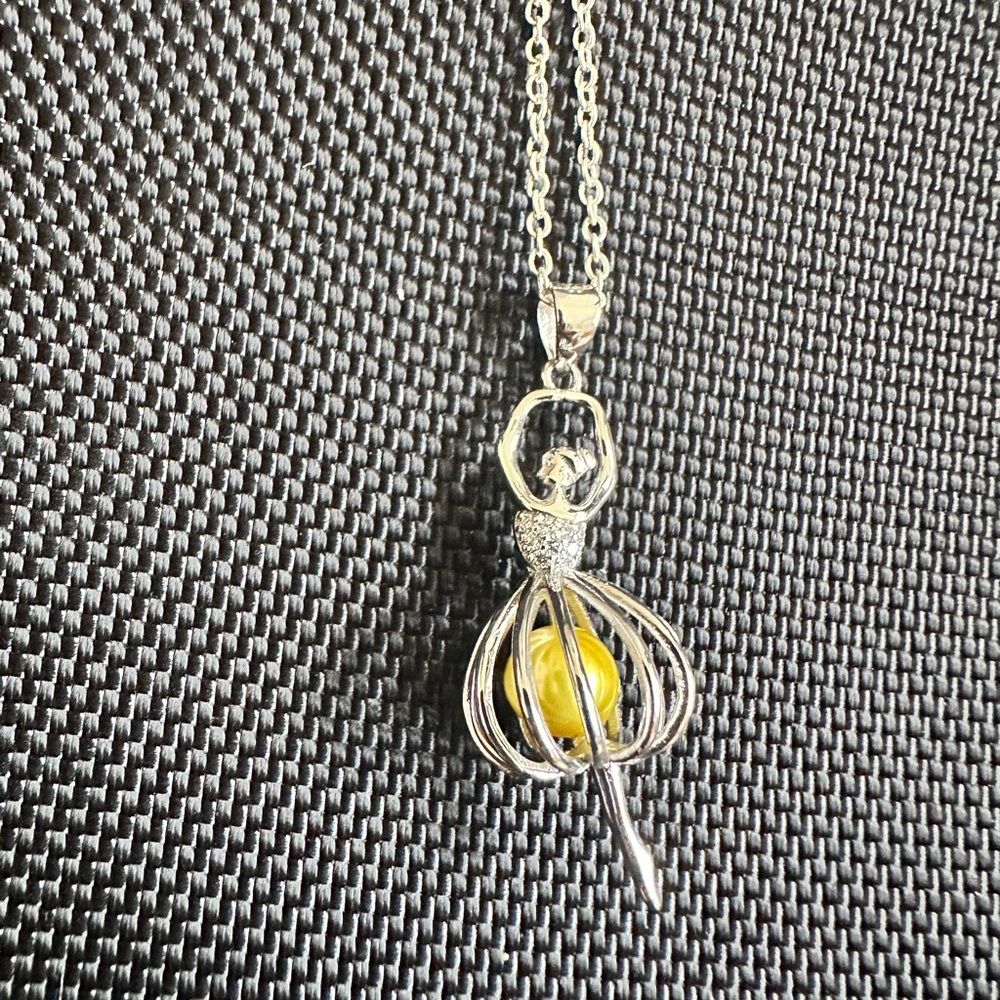 Elegant Silver Ballerina Pendant Necklace with Yellow pearl Accent